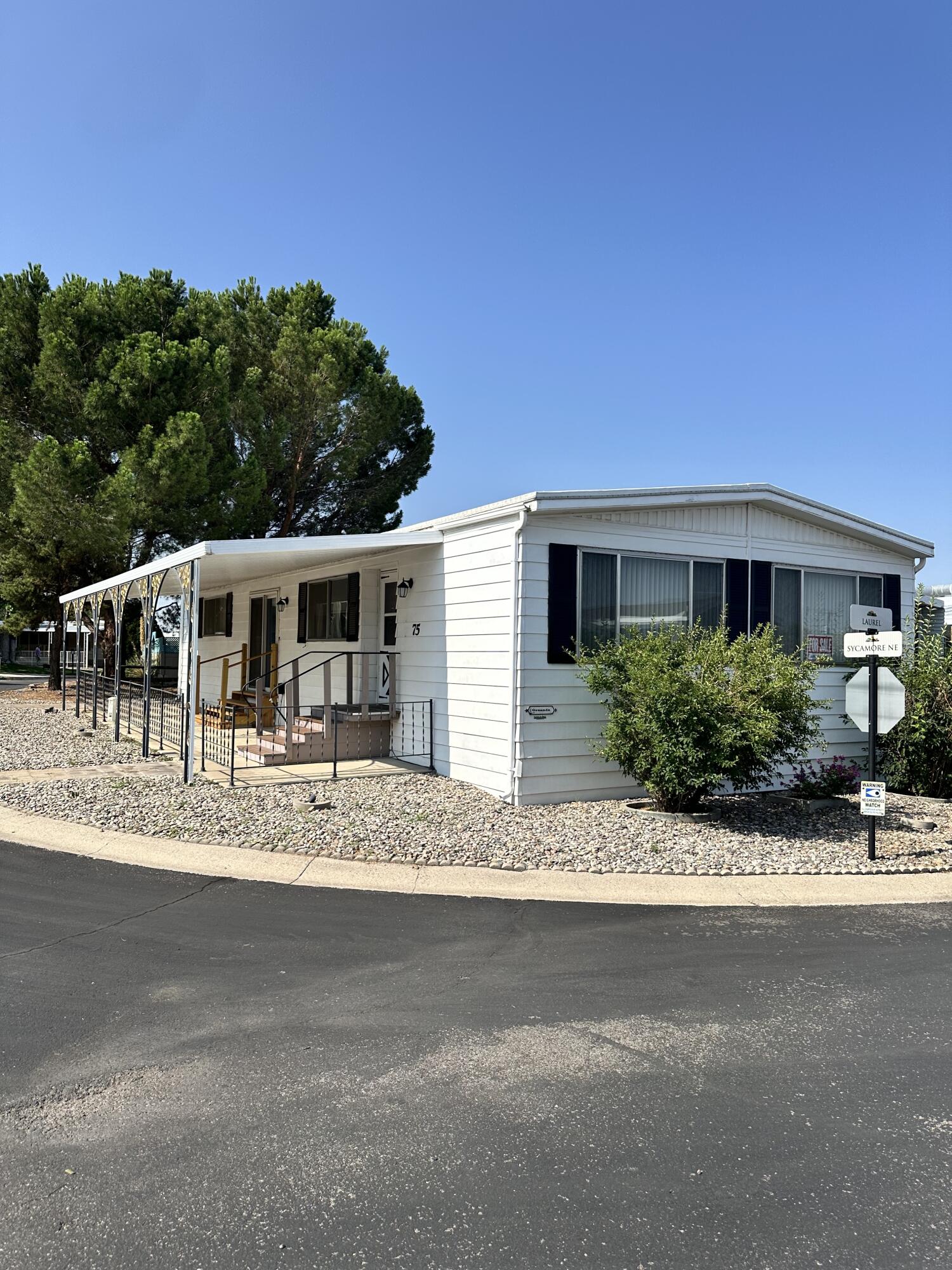 Photo 2 of 2 of 7112 Pan American East NE 75 mobile home