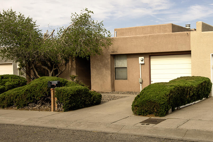 Photo 1 of 28 of 4805 Osuna Place NE townhome