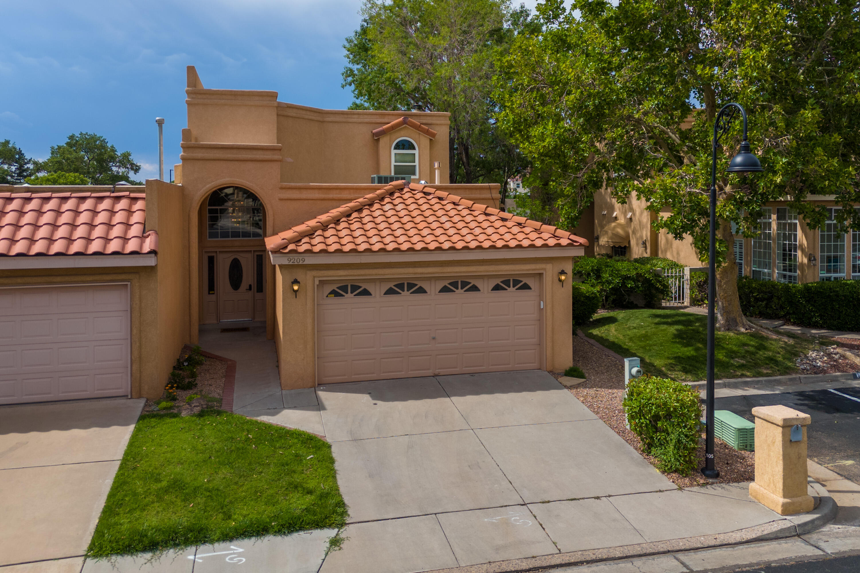 Photo 1 of 48 of 9209 Palm Beach NE townhome