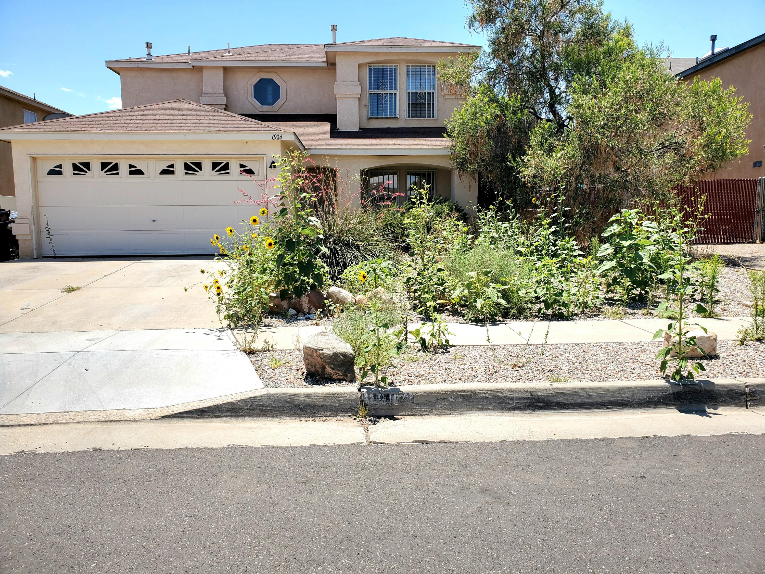 Photo 1 of 10 of 6904 Zinnia Place NW house