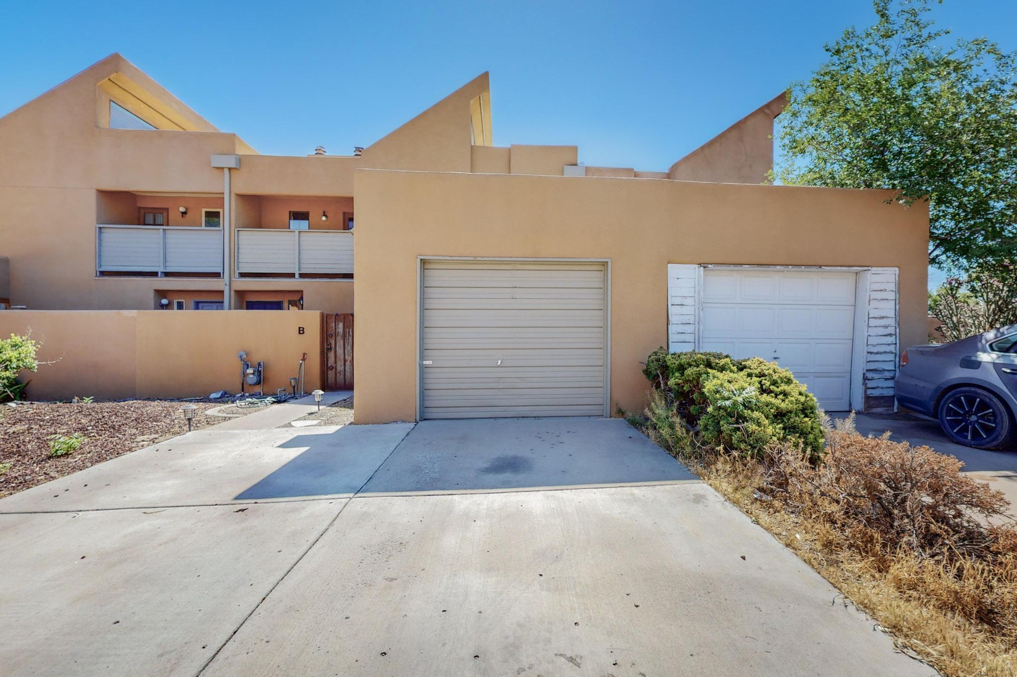 Photo 1 of 39 of 717 Candelaria Road NW Unit B townhome