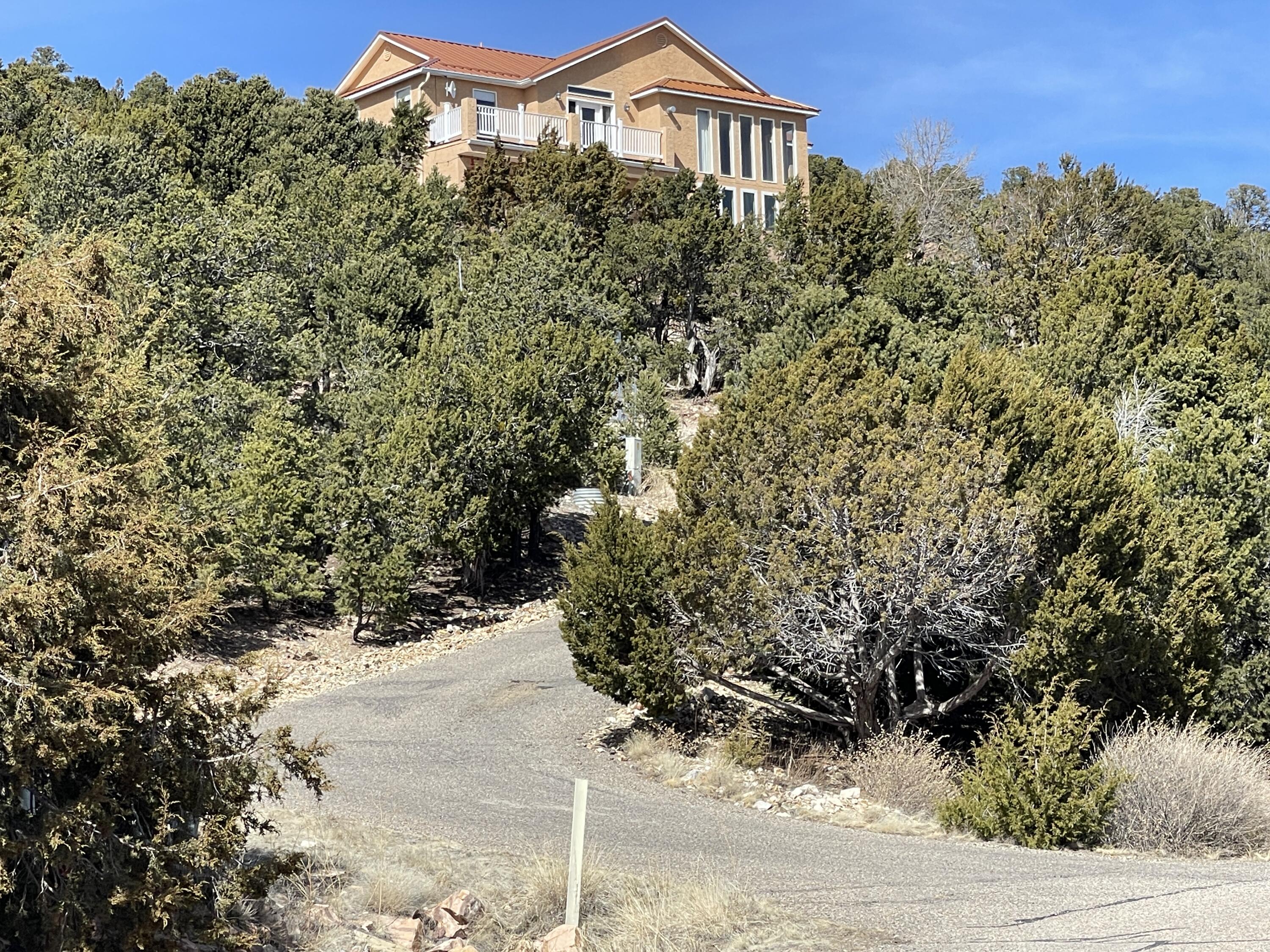 Photo 1 of 34 of 96 Sandia Mountain Ranch Drive house