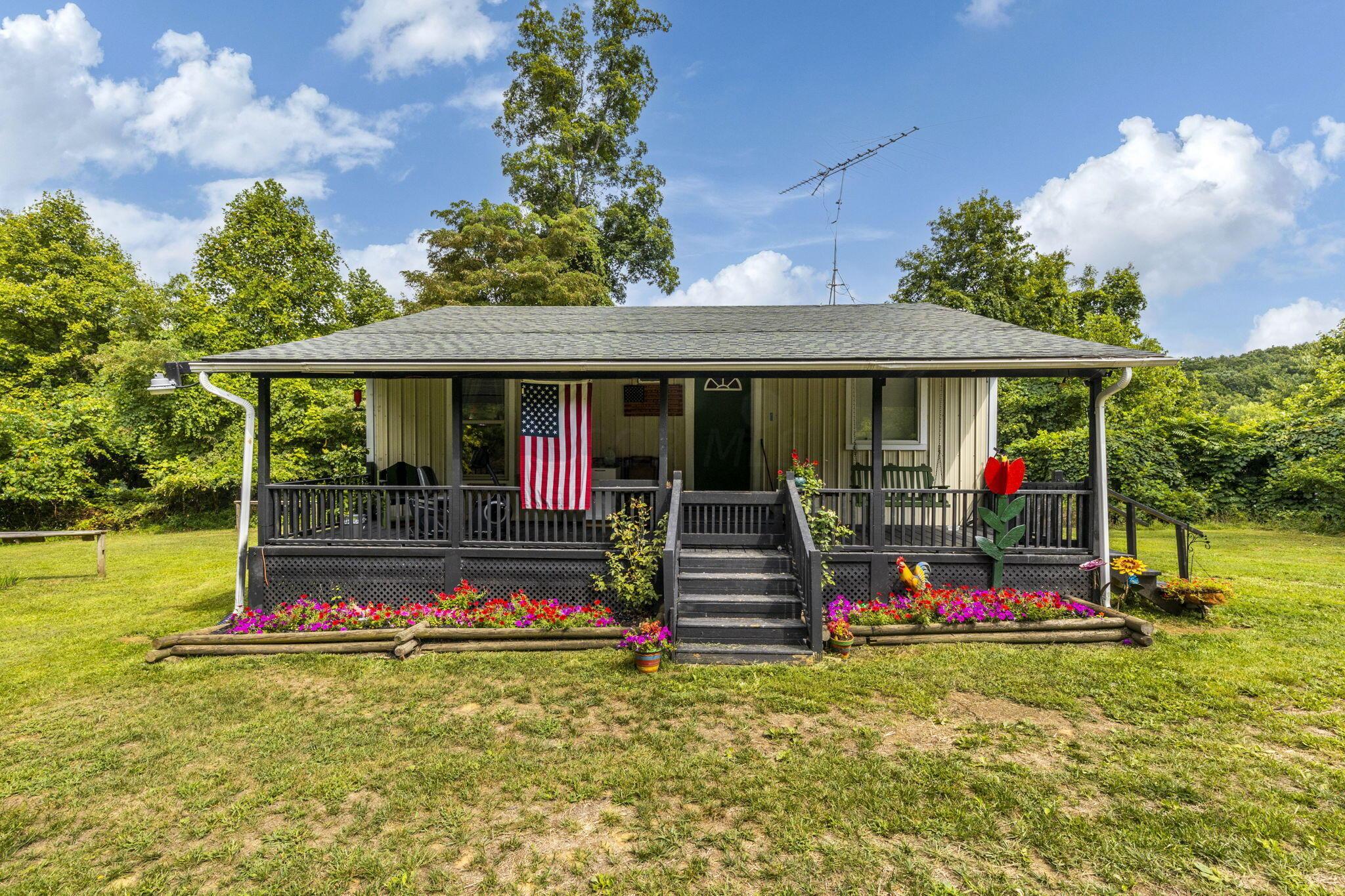 Photo 1 of 38 of 13207 Clapper Hollow Road house