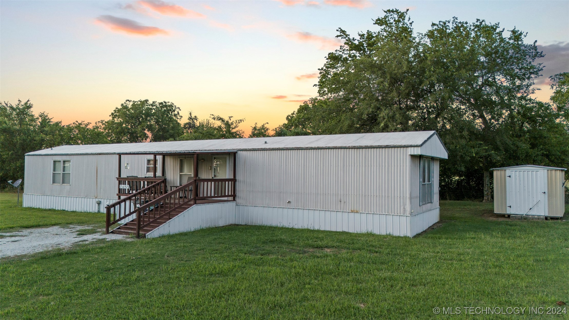 Photo 2 of 11 of 7692 County Road 1525 mobile home