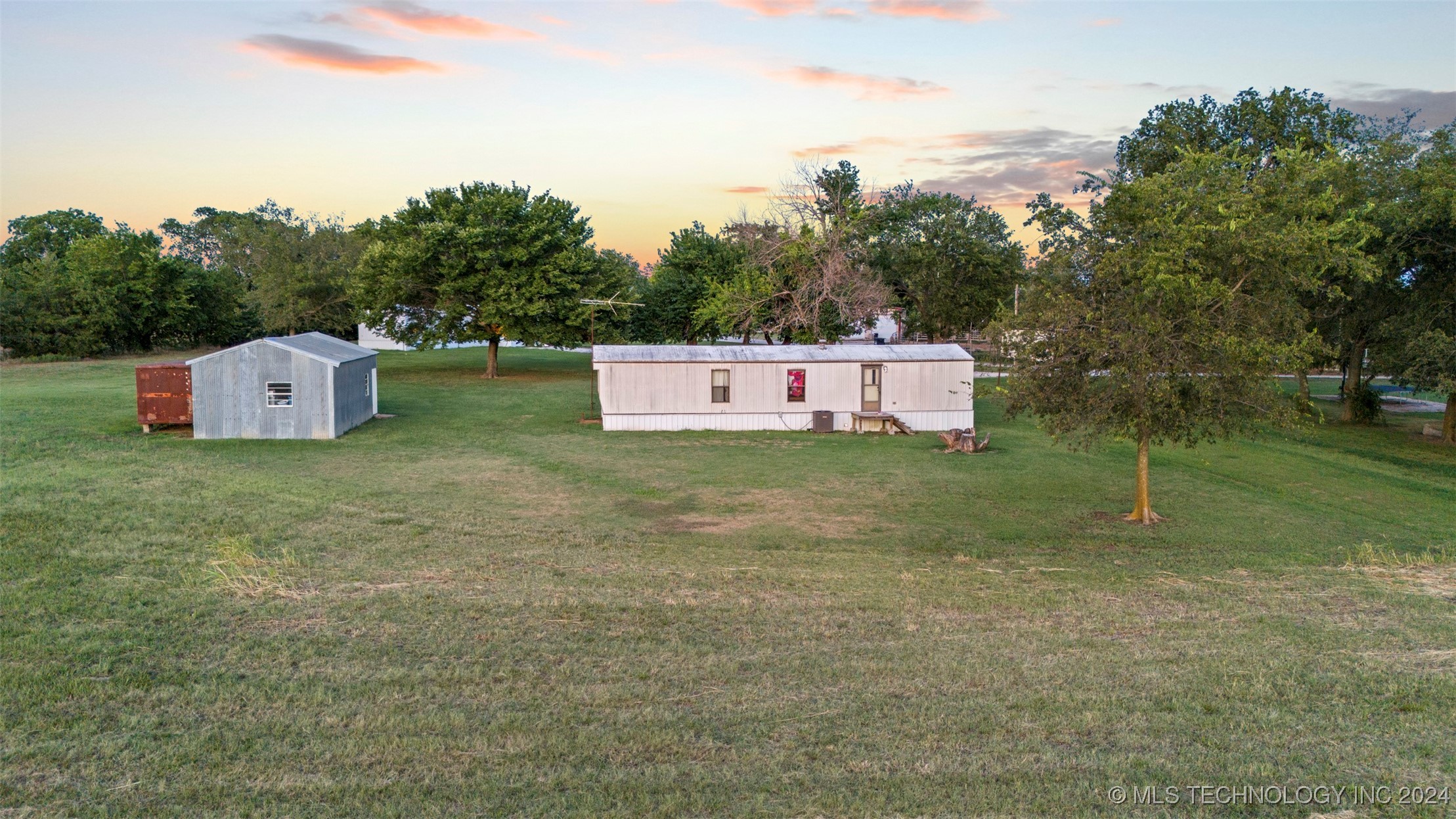 Photo 5 of 11 of 7692 County Road 1525 mobile home