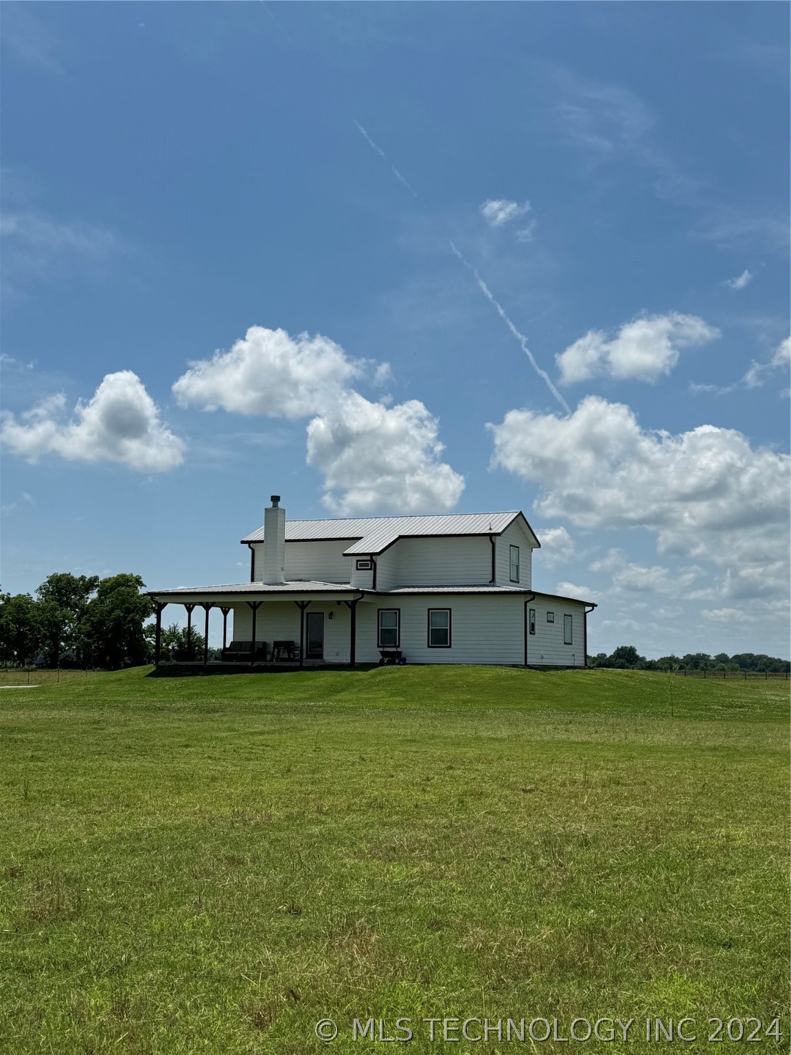 Photo 3 of 12 of 17205 S Garnett Road house