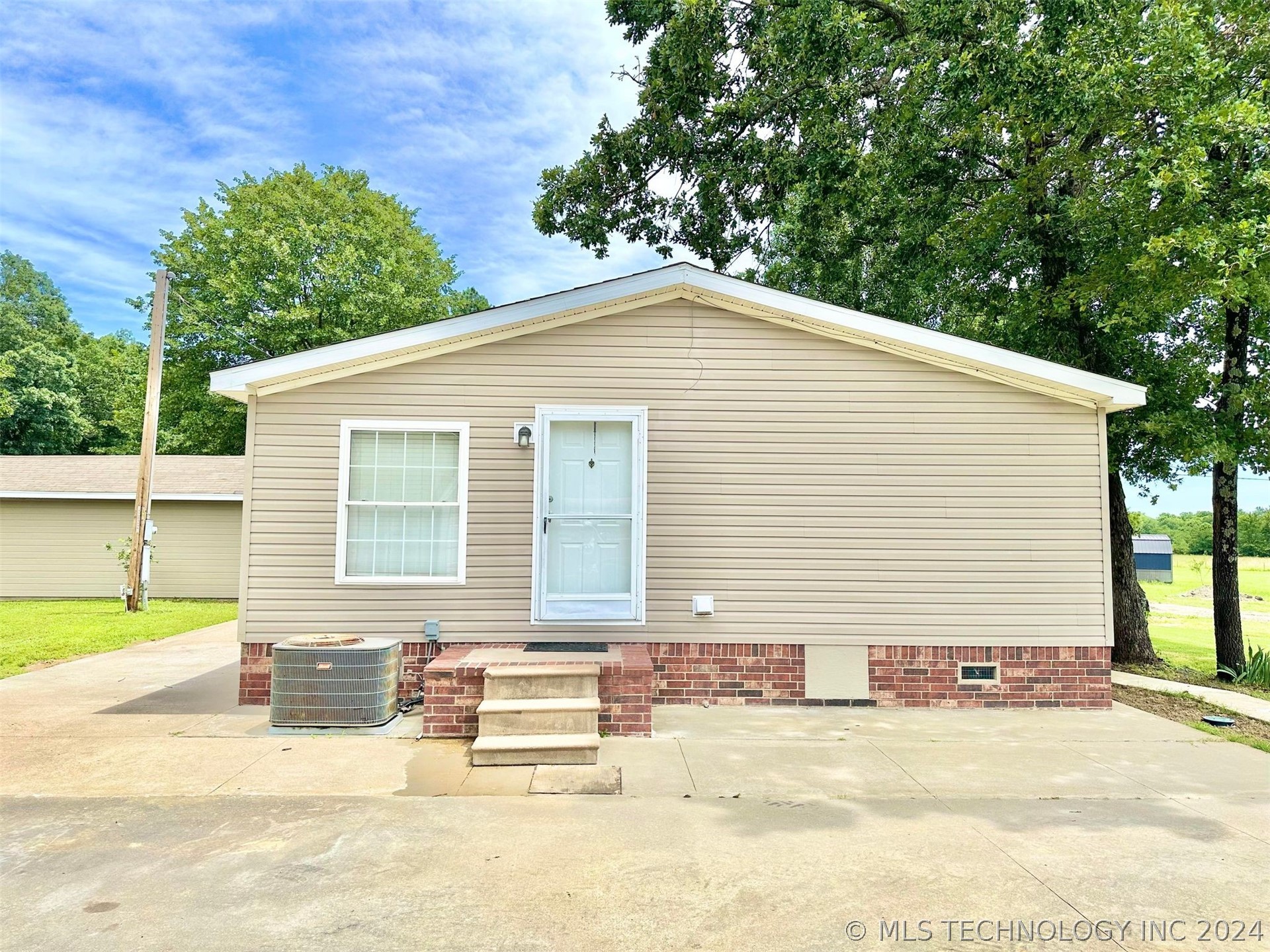 Photo 6 of 36 of 105700 S 4306 Road mobile home