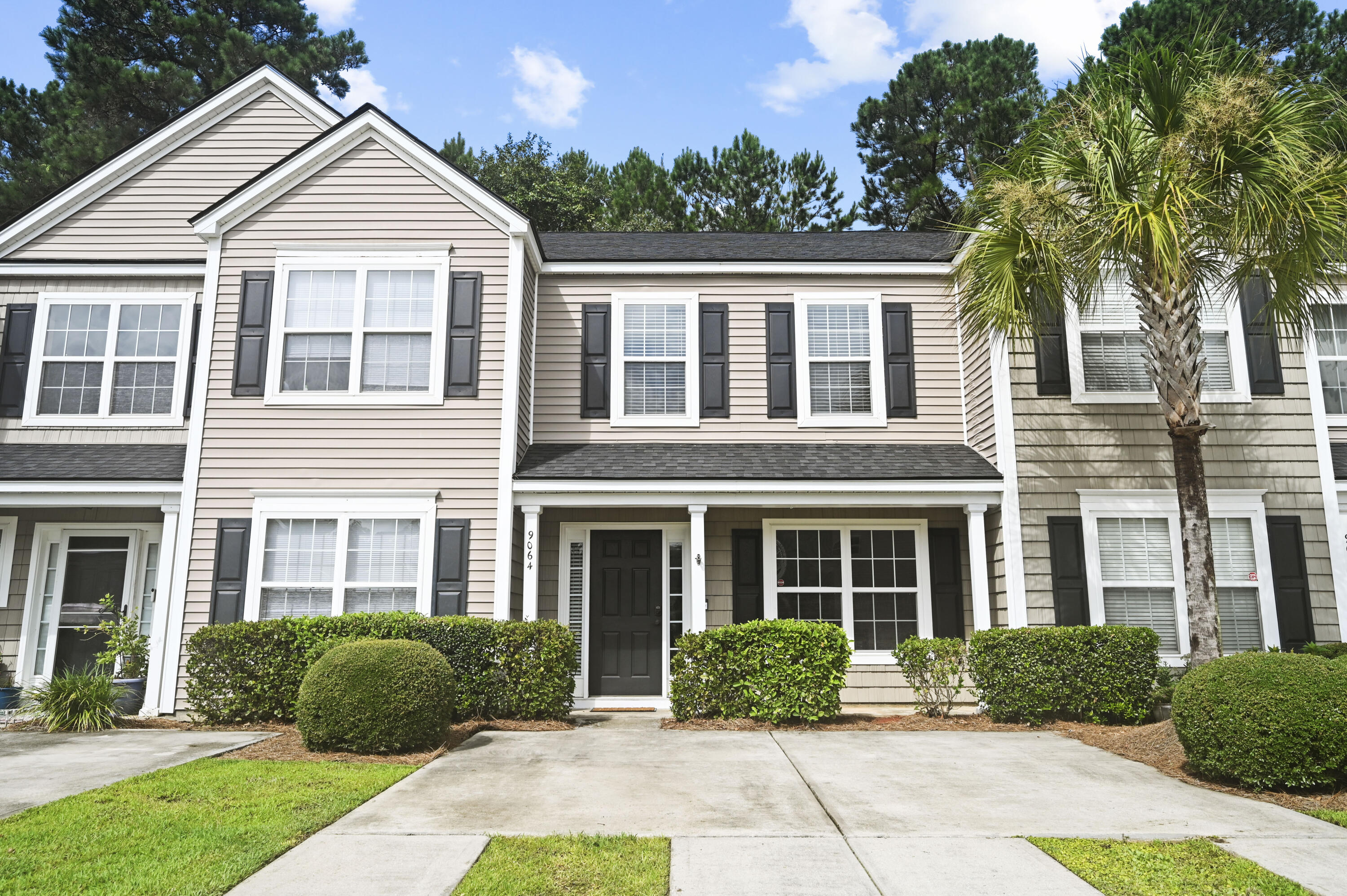 Photo 1 of 18 of 9064 Maple Grove Drive townhome