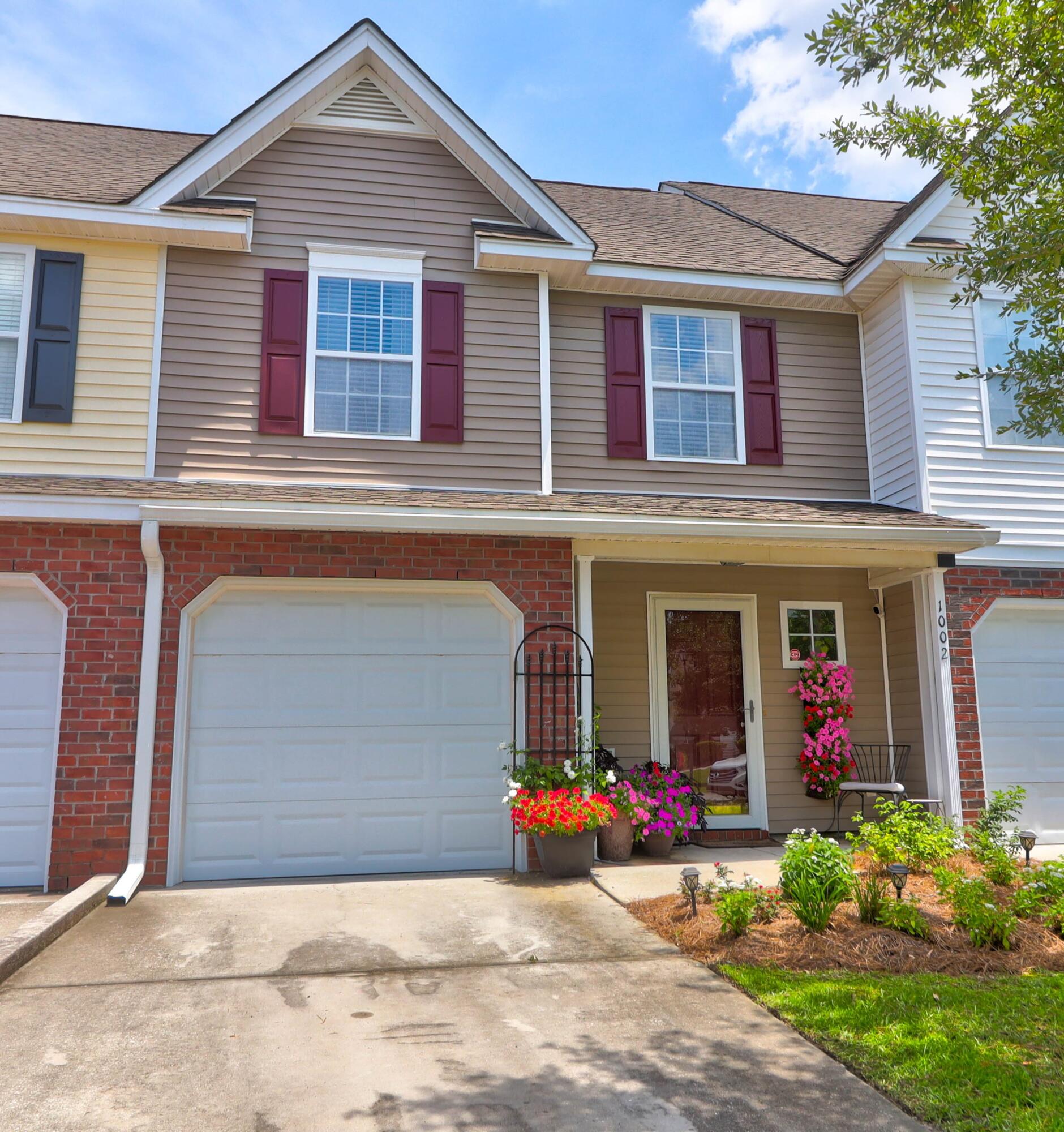 Photo 2 of 53 of 1002 Poplar Grove Place townhome