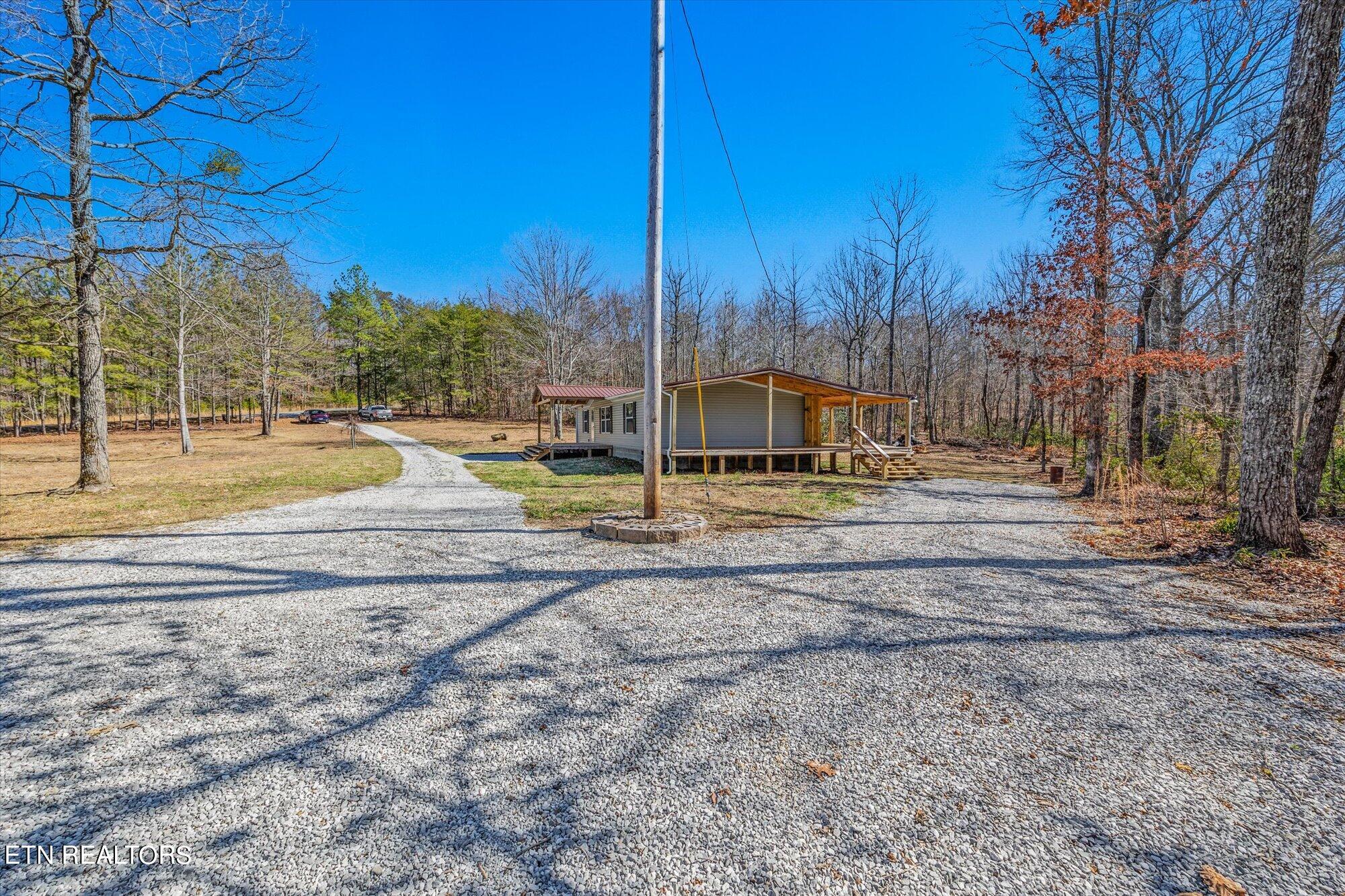 Photo 4 of 32 of 6889 Baker Mountain Rd mobile home